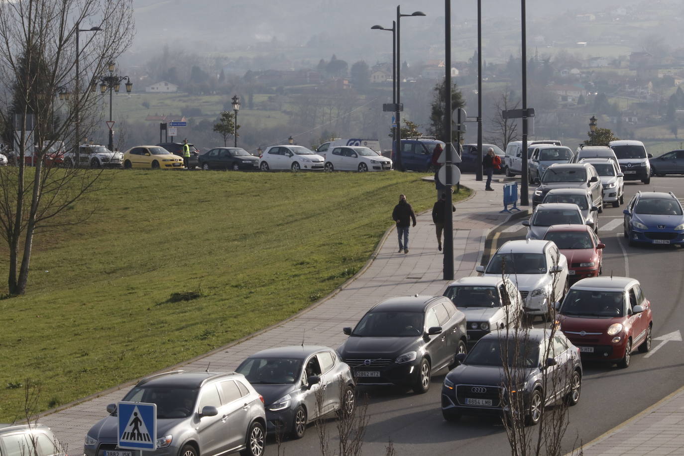 Fotos: Largas colas para hacerse una PCR en el HUCA