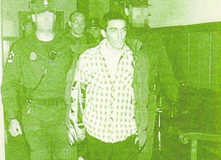 Los procesados, al entrar en la sala.