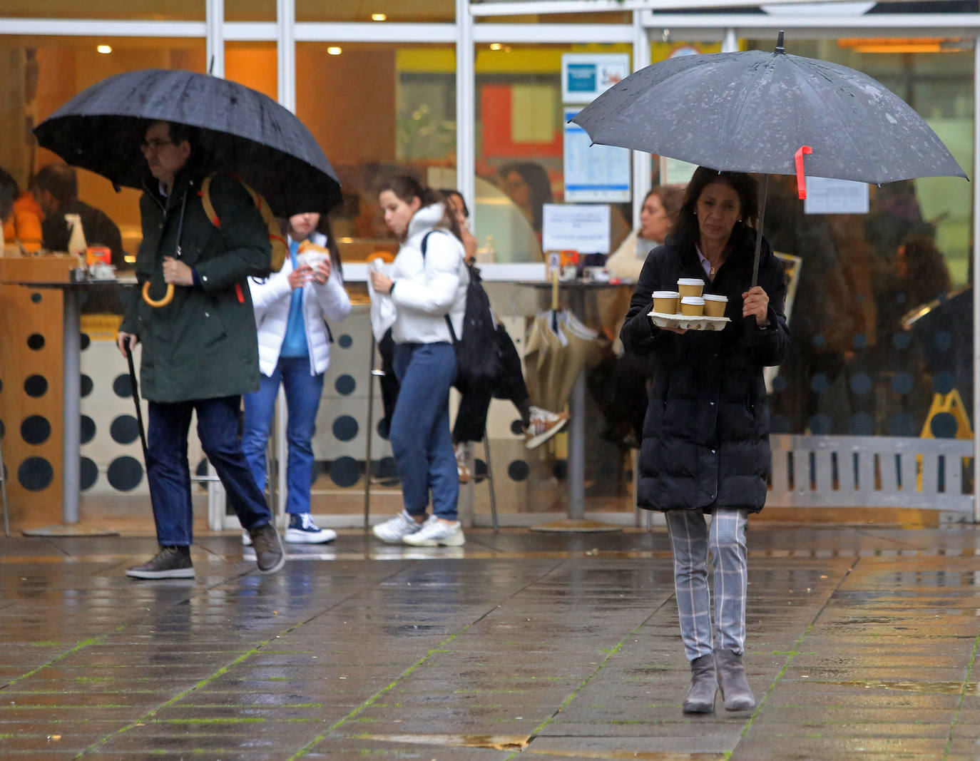 Fotos: Un frente cálido deja este lunes lluvias por toda la región