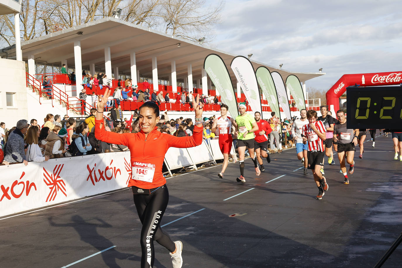 Fotos: ¿Participaste en la Carrera de Nochebuena de Gijón? ¡Búscate!