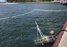 Se hunde un barco que estaba amarrado en el muelle de Ribadesella