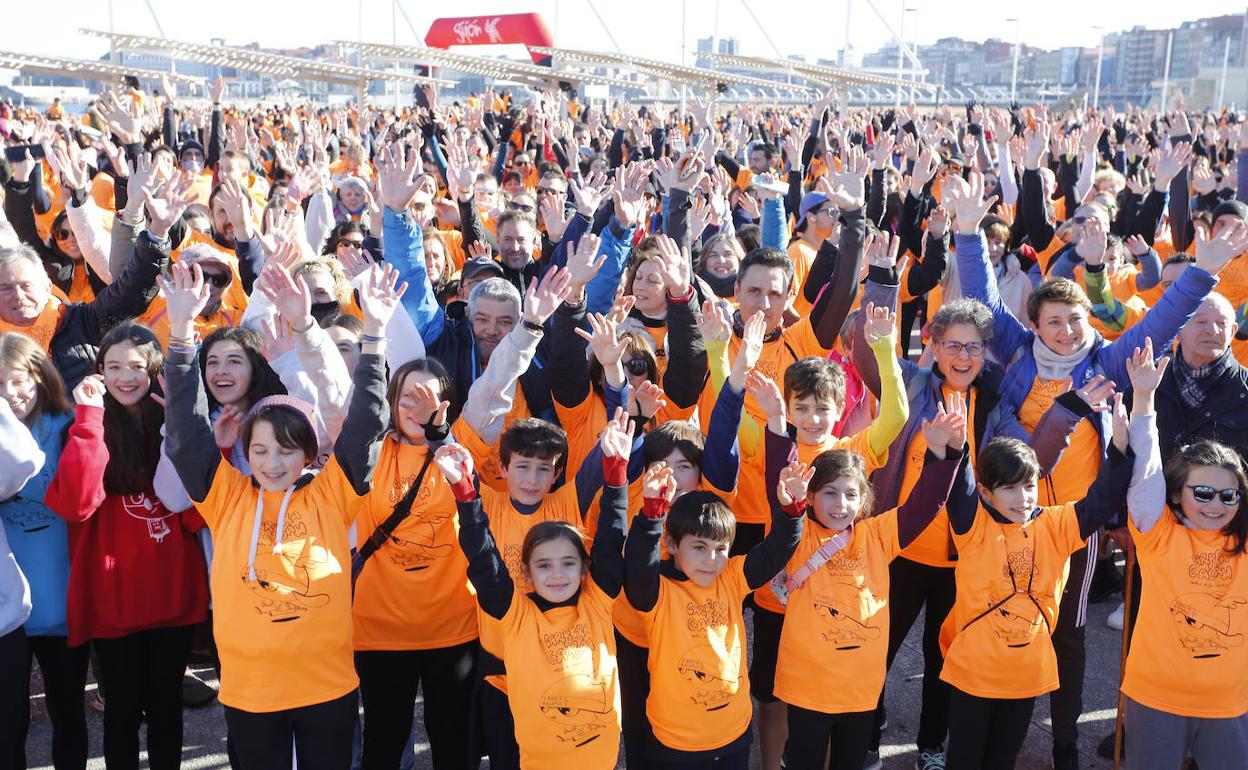 Miles de participantes, en la carrera organizada en Gijón