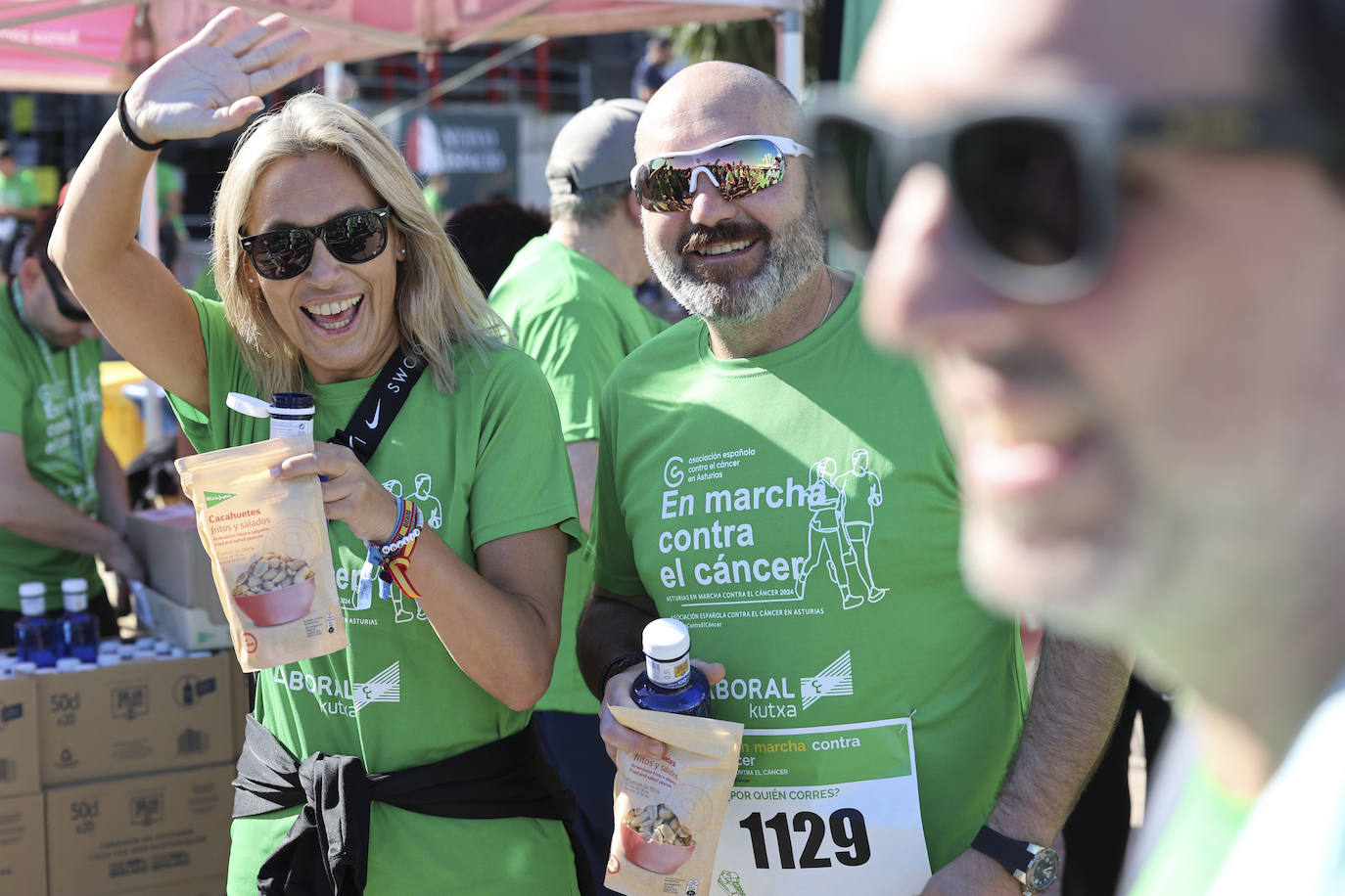 Una marea verde marcha contra el cáncer en Gijón