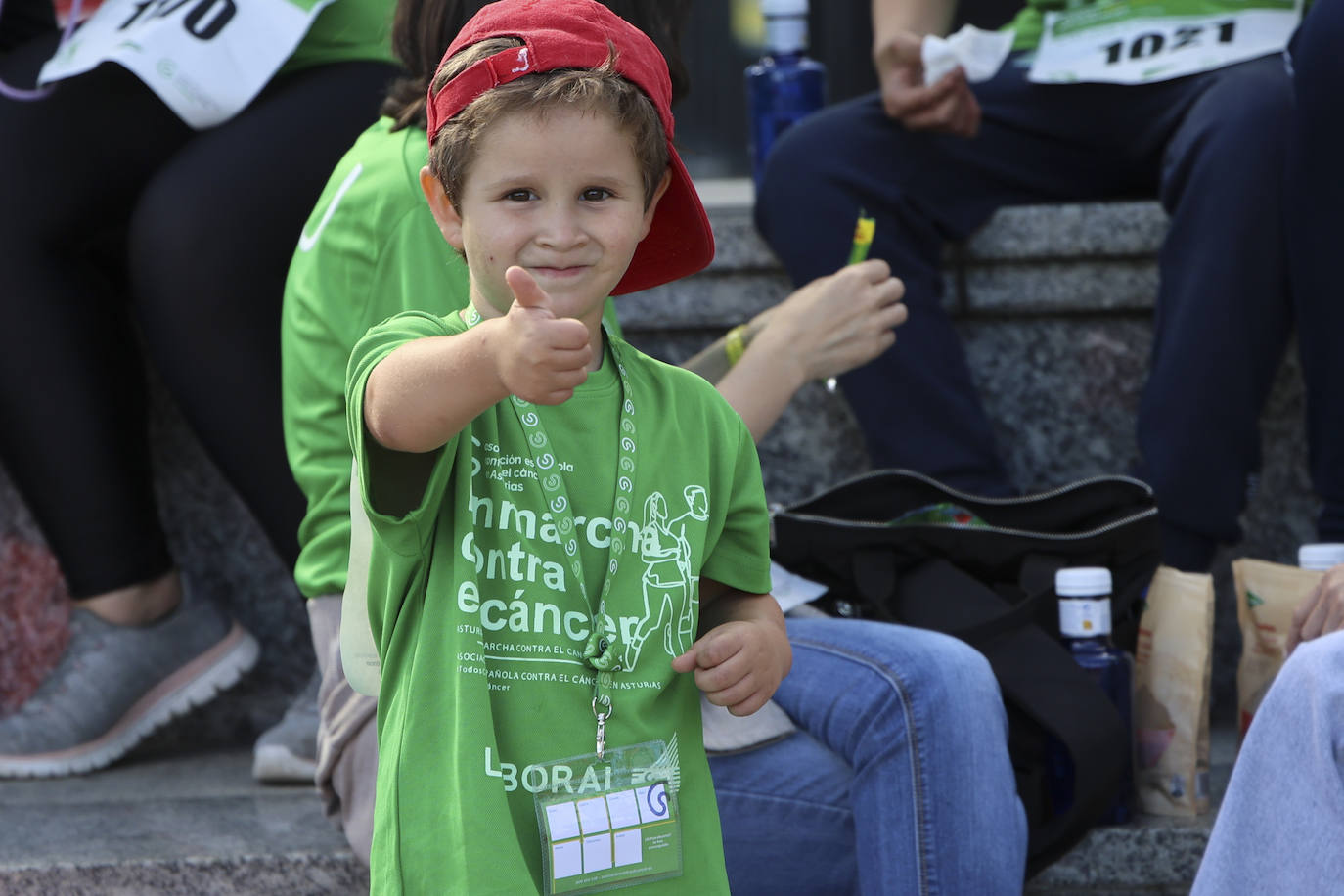 Una marea verde marcha contra el cáncer en Gijón