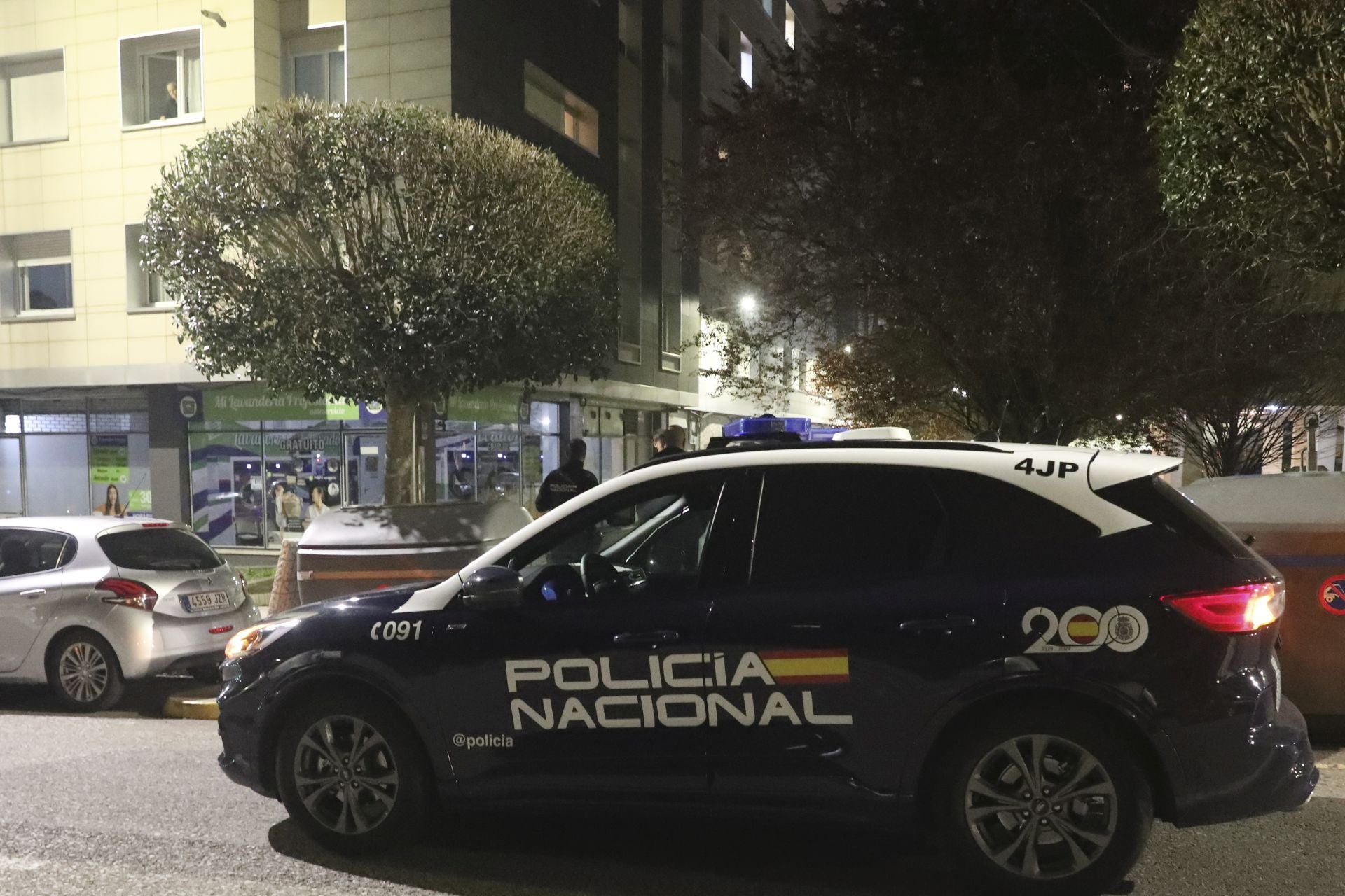 Un coche de la Policía Nacional en Gijón.