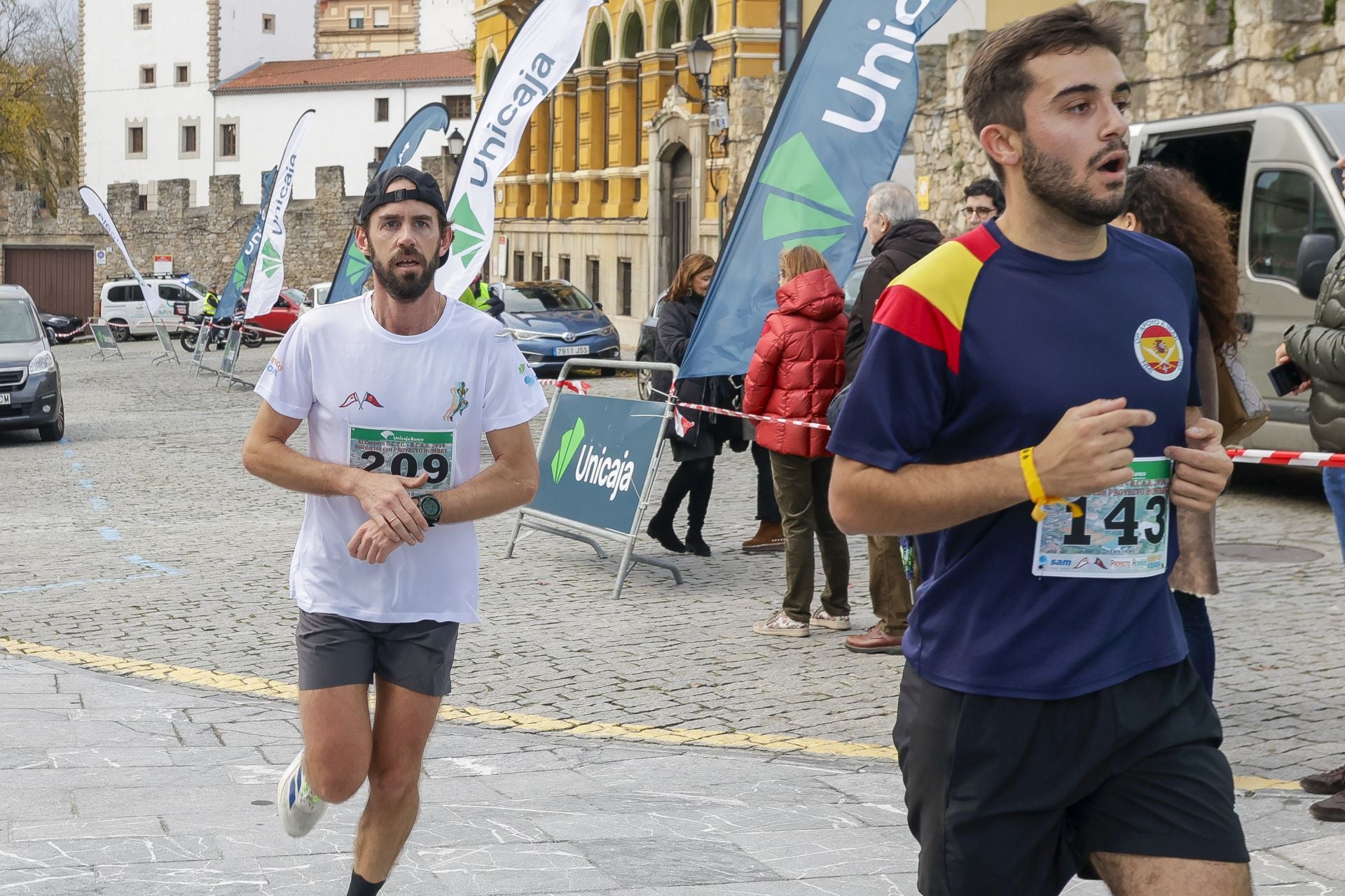 La carrera entre el club de Tenis y el club de Regatas de Gijón, en imágenes