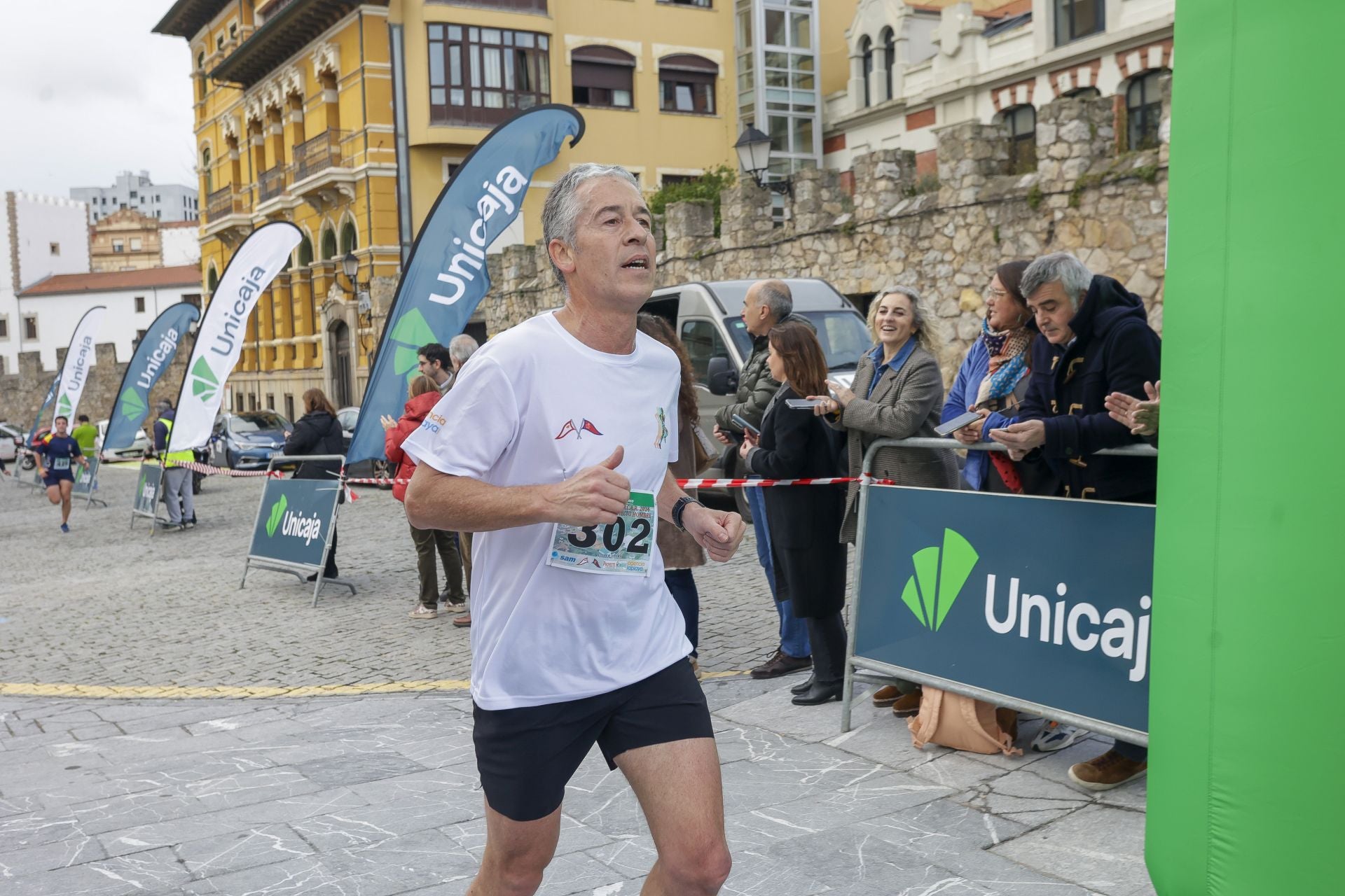 La carrera entre el club de Tenis y el club de Regatas de Gijón, en imágenes