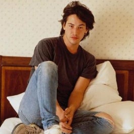 a) Keanu Reeves