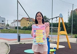 Patricia Suárez con el cartel.