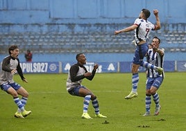 Raúl Hernández celebra su gol al Talavera con Campabadal, Quicala y Javi Cueto.