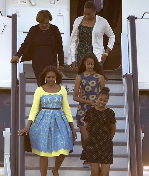 Michelle Obama, con sus hijas.