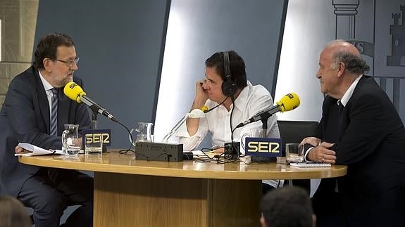 Mariano Rajoy, el periodista José Ramón de la Morena y Vicente del Bosque.