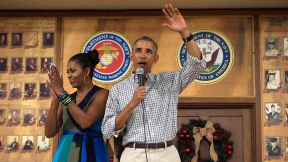 Obama y su mujer, Michelle. 