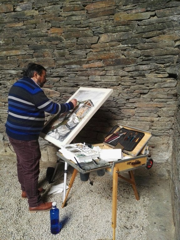 Un artista plasma uno de los rincones del concejo. :: D. S. F.