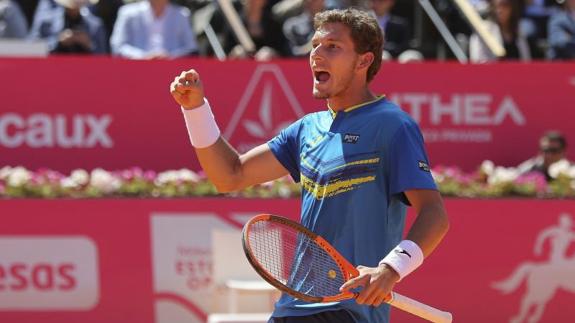 Pablo Carreño celebra su victoria frente a Almagro.