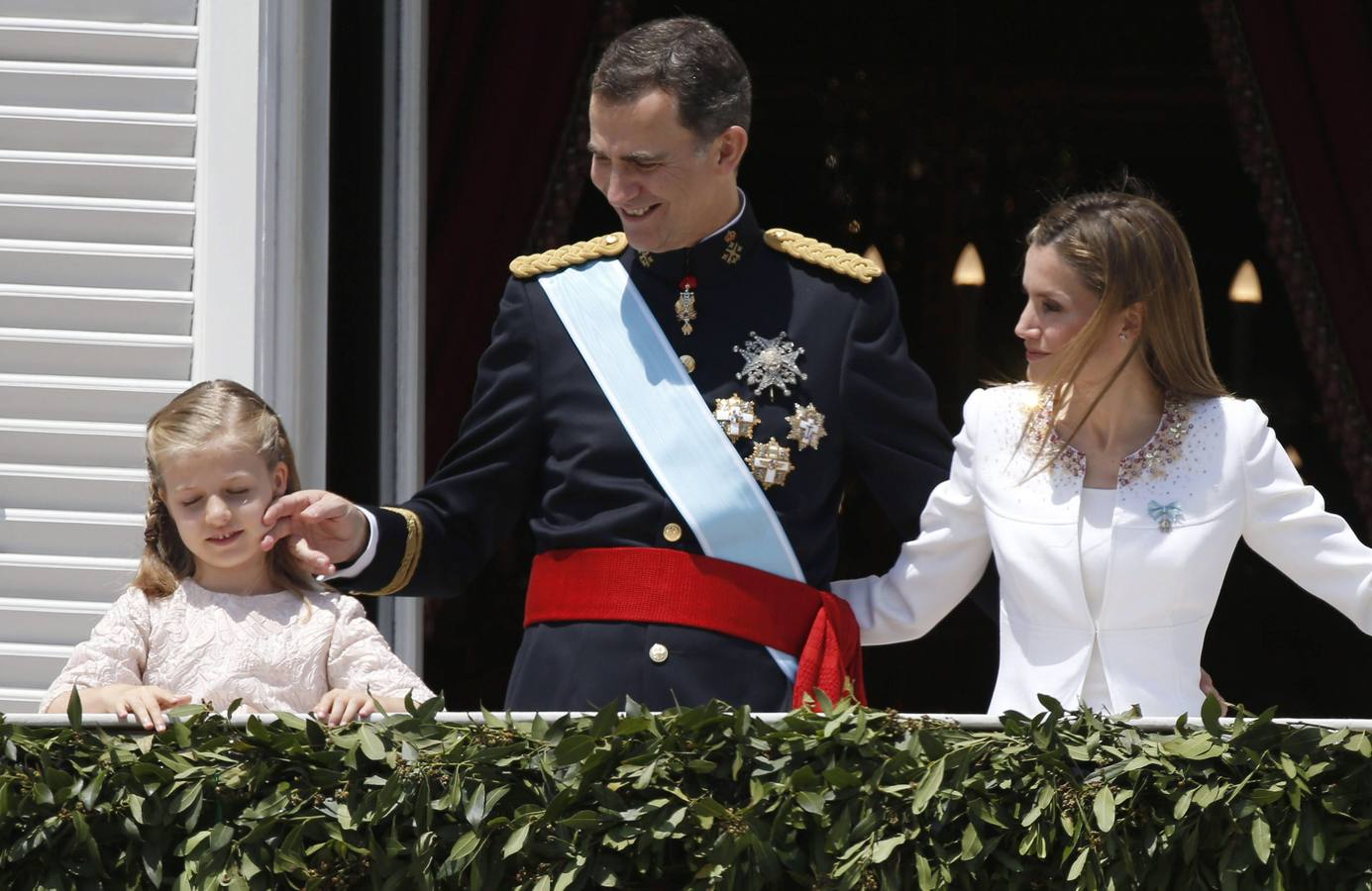 Los Reyes saludan desde el Palacio Real