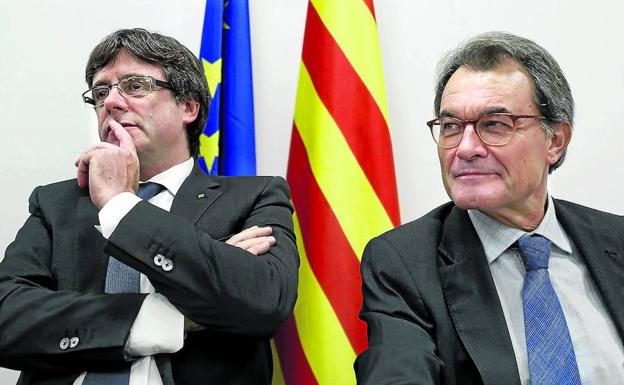 Puigdemont y Mas, en el comité nacional que el PDeCAT celebró el pasado 2 de octubre, después del referéndum.
