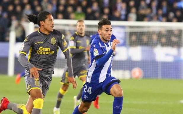 Mauricio Lemos, de Las Palmas, junto a Munir.