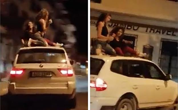 Las dos chicas, sobre el techo del coche en marcha. 