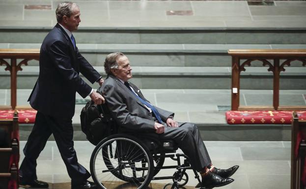 George Bush padre e hijo. 