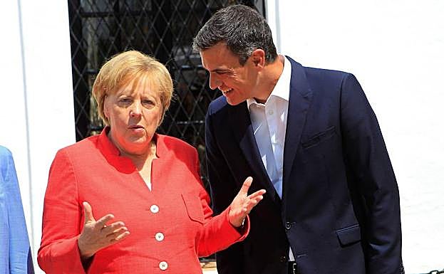 Ángela Merkel y Pedro Sánchez.