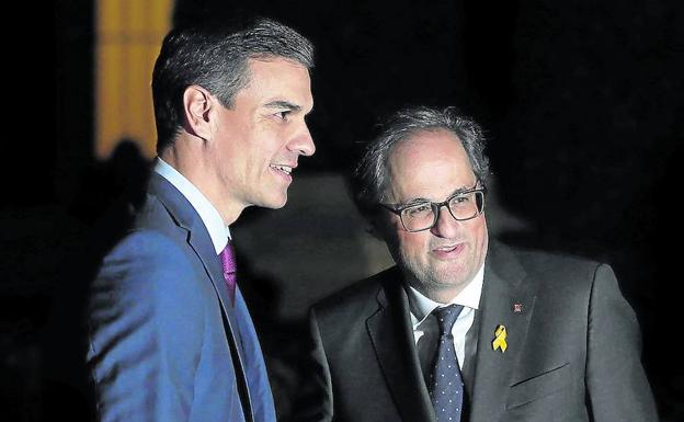 Pedro Sánchez y Quim Torra, en la reunión que mantuvieron en Barcelona en diciembre. 