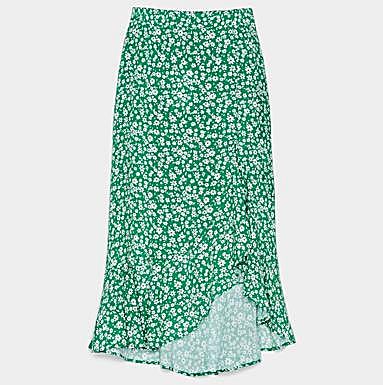 Imagen principal - Arriba, falda de flores de Bershka (19,99 euros). Abajo a la izquierda, falda de lunares, de Zara (25,95 euros). A la derecha, falda estampada de Zara (29,95 euros).