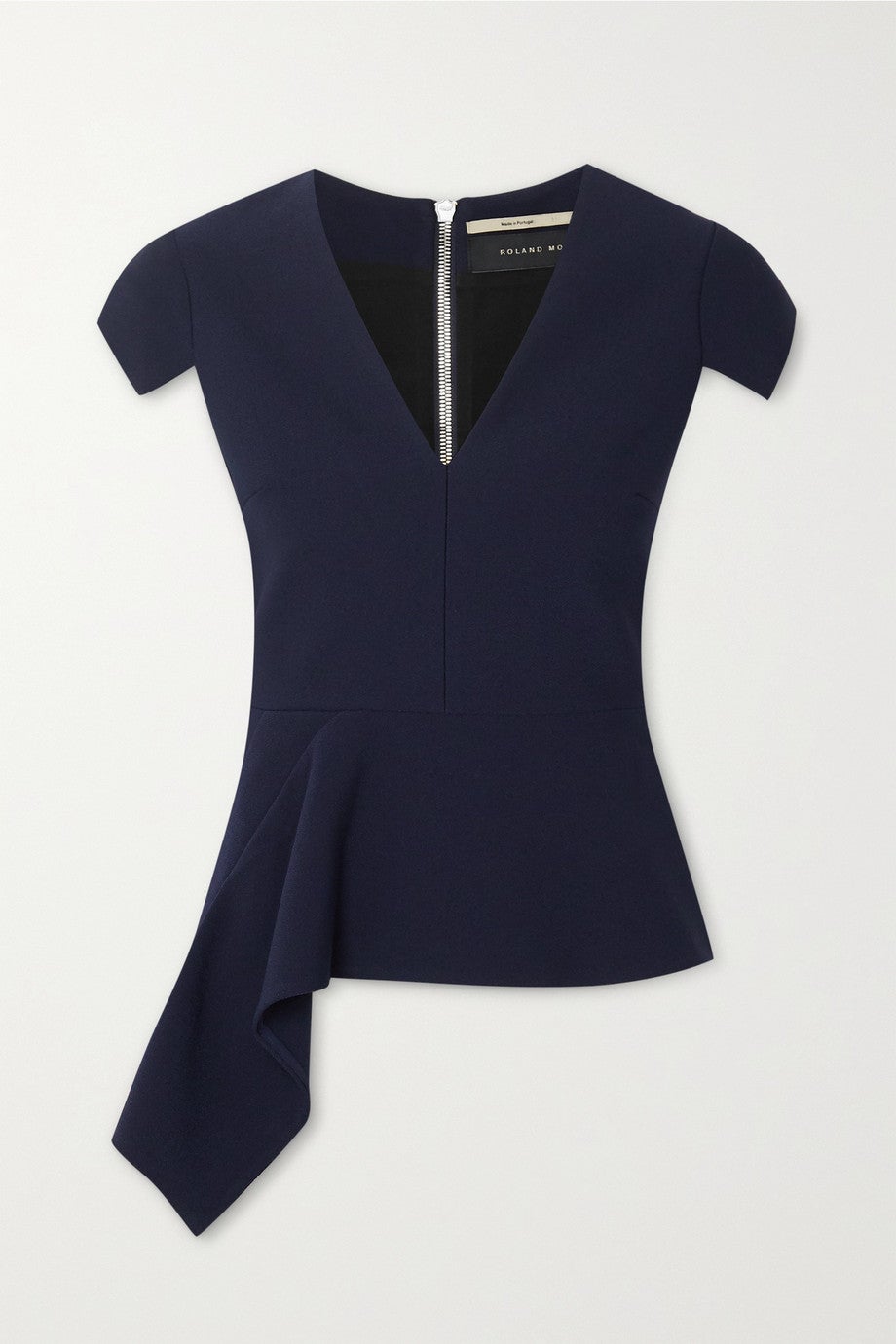 Top de crepé con peplum, de Roland Mouret (510 euros).