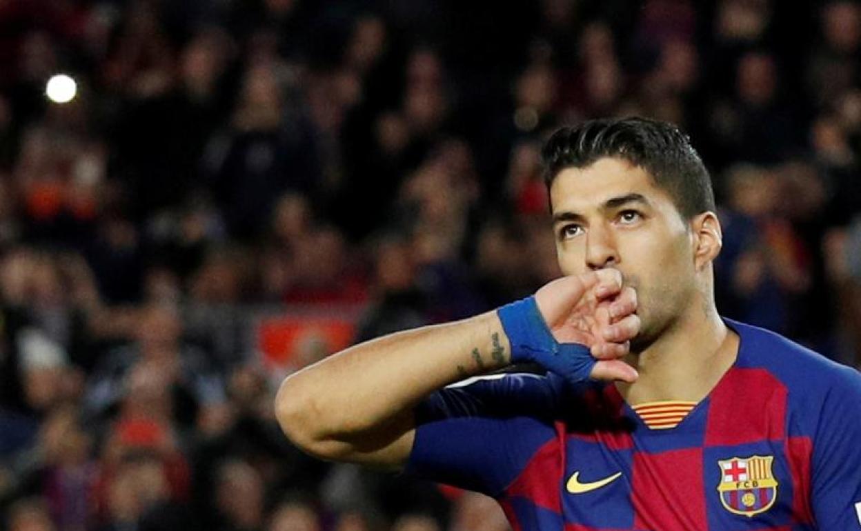 Luis Suárez celebra uno de sus goles con el Barça. 