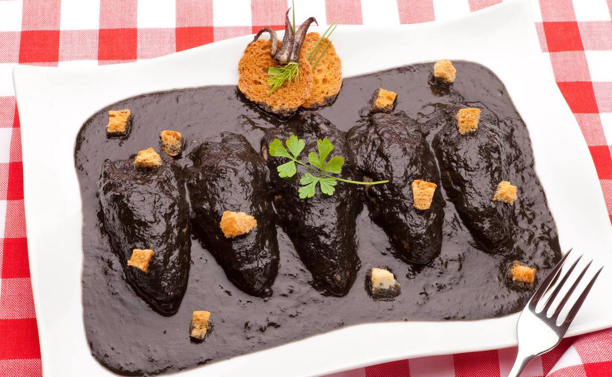 Txipirones en su tinta, el luto más alegre