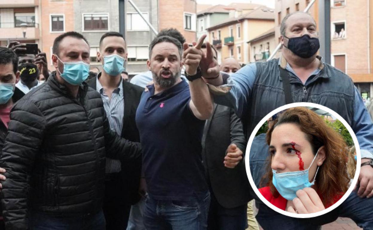 Abascal se encara con algunos radicales que le lanzaron piedras. A la derecha, De Meer tras recibir la pedrada.