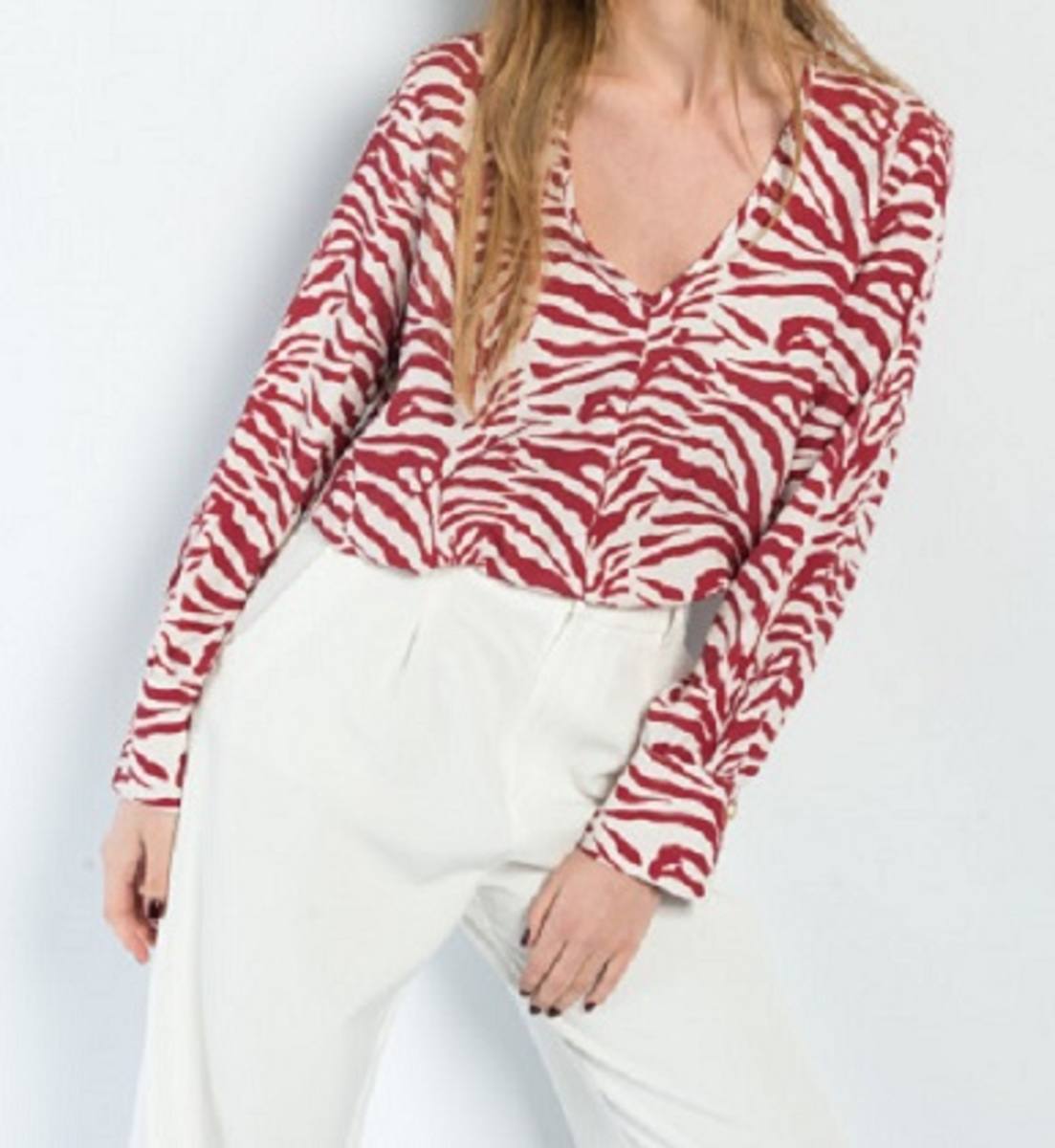 22. Blusa con estampado de cebra de la tienda Adel moda, ubicada en la calle Torrene número 13. Cuesta 19,95 euros.