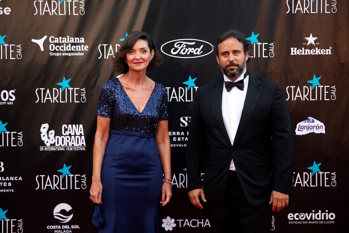 La ministra de Industria, Comercio y Turismo, Reyes Maroto (i) y el empresario Ignacio Maluquer