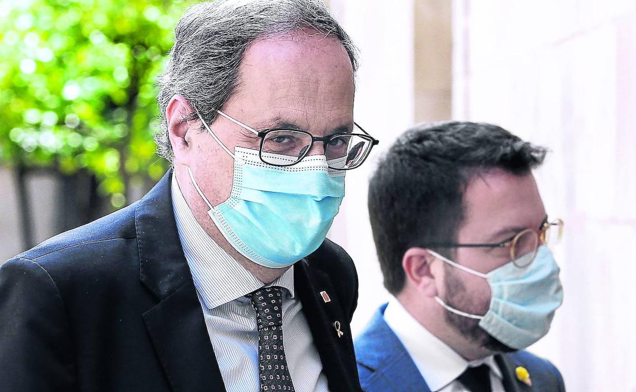 Quim Torra, con el actual presidente de la Generalitat, Pere Aragonès, en septiembre de 2020. 