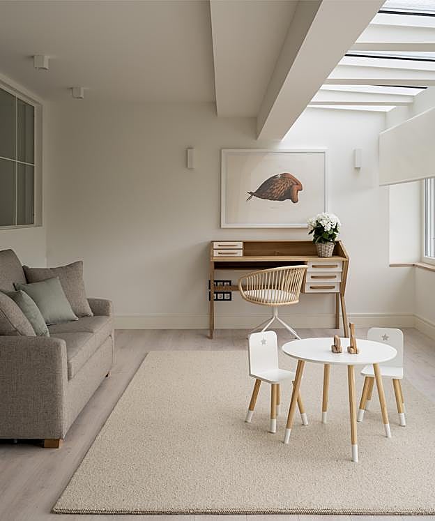 Zona de juegos con acceso al jardín