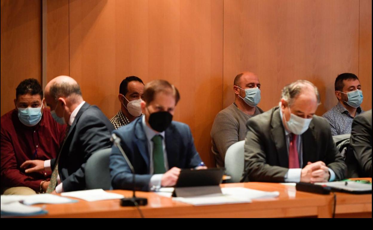 Los cuatro acusados, durante el juicio.