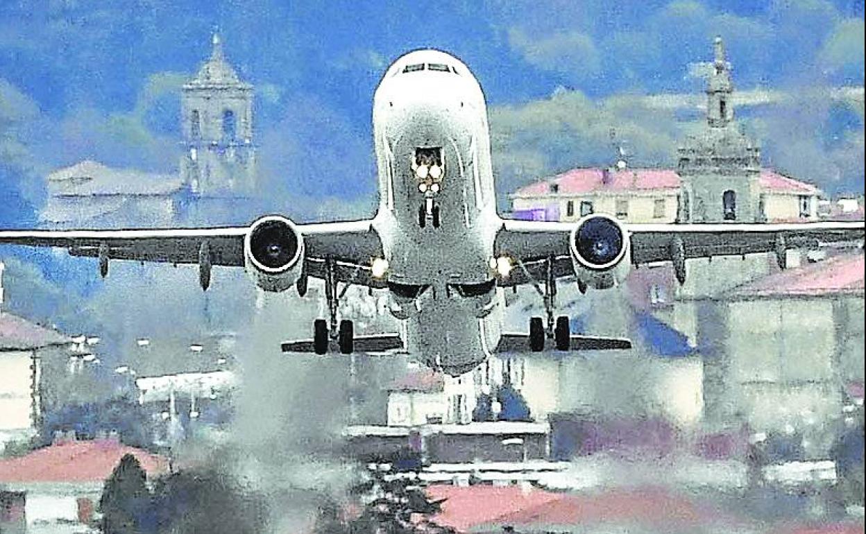 Un avión toma vuelo en el aeródromo de Bilbao.