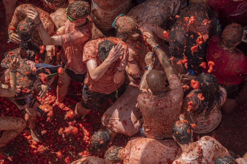 Fotos: Vuelve la fiesta del tomate a las calles de Buñol tras dos años de parón