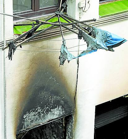 Imagen - Una ventana del bloque incendiado.