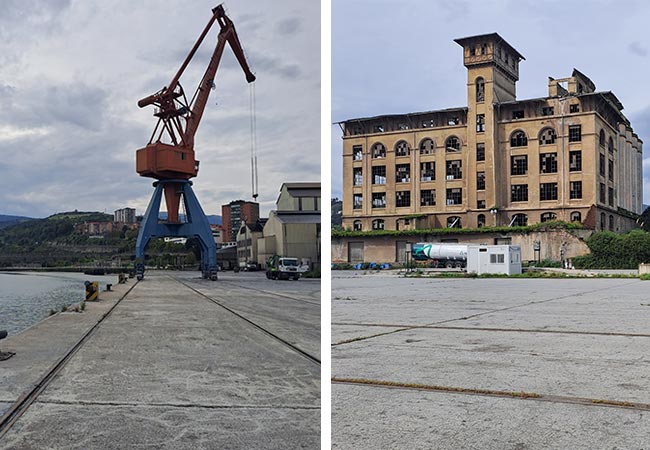 A la izquierda, la explanada de los antiguos terrenos del Puerto por la que no es posible conectar con Olabeaga. A la derecha, el edificio de los Molinos Vascos.