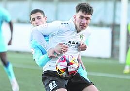 Un lance del partido.