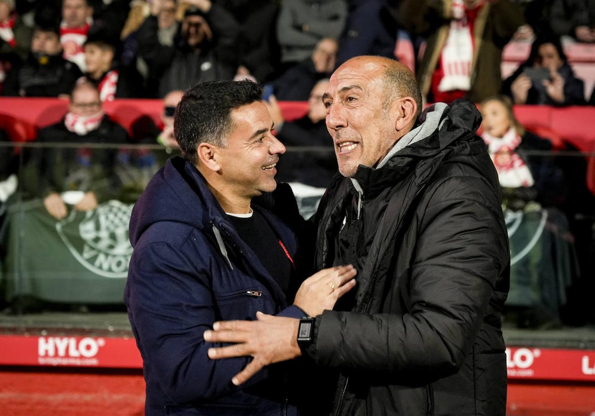 Michel saluda a Pedro Rostoll, ayudante de García Plaza.