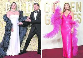 A la izquierda, Lily Gladstone, mejor actriz dramática por 'Los asesinos de la luna', con Leonardo DiCaprio. Y a la derecha, Margot Robbie, que estaba nominada por su papel protagonista en 'Barbie'.