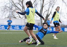 Dos albiazules, durante un entrenamiento.