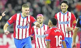 Los jugadores del Girona celebran un gol en un encuentro de esta temporada.