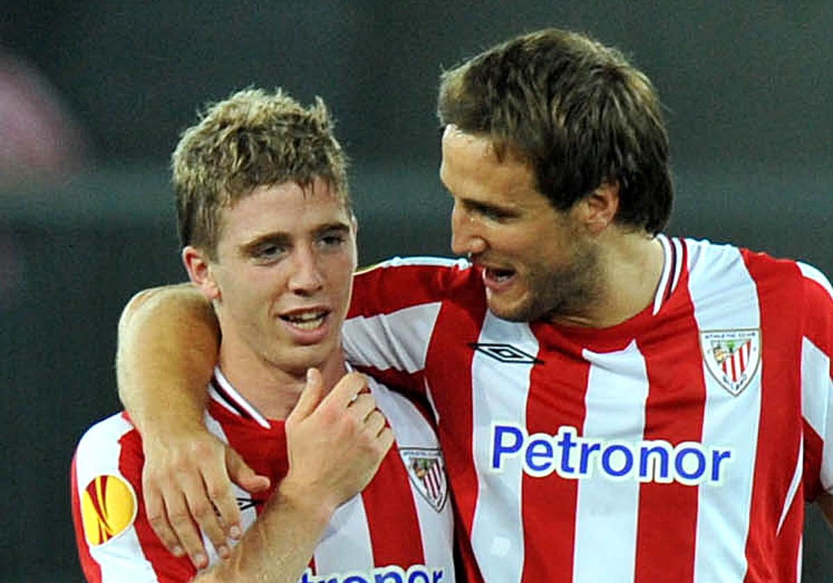 Muniain, con Carlos Gurpegui.