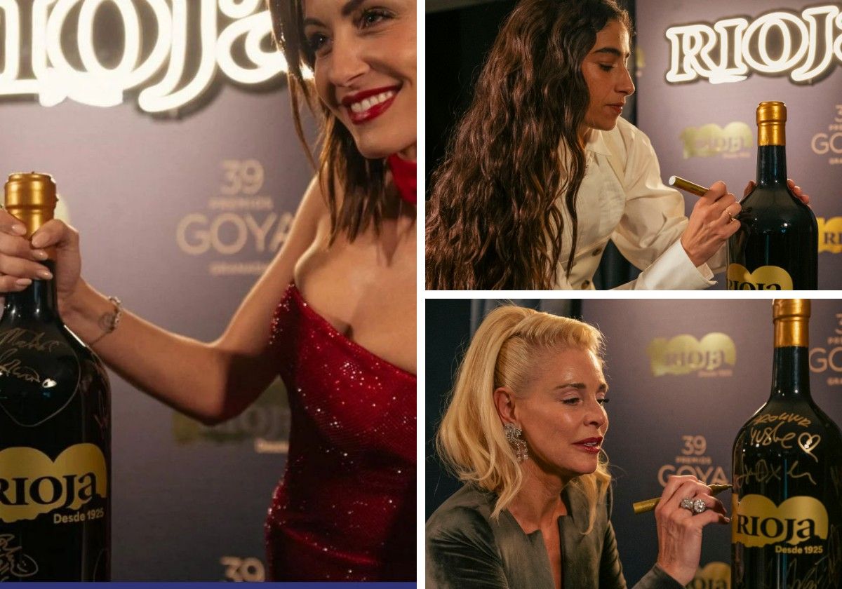 La actriz Hiba Abouk posa junto a una de las botellas, mientras Carolina Yuste y Belen Rueda firman en otra.