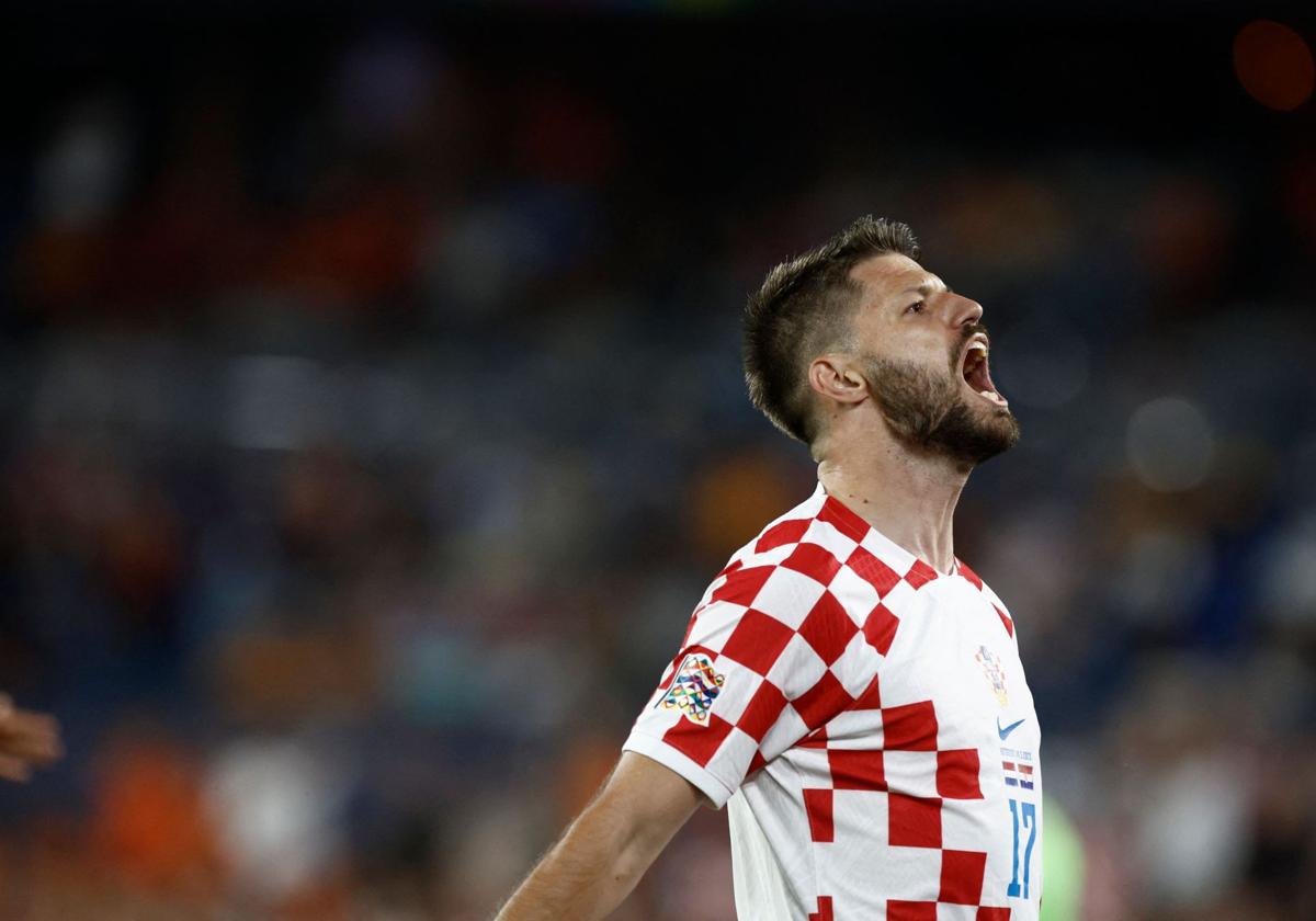 Petkovic celebra un gol con Croacia.