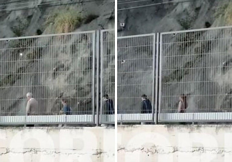 Viajeros caminando por las vías entre San Ignacio y Lutxana tras la avería del metro