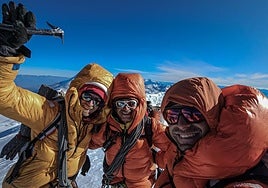 Iker y Eneko Pou, junto a Micher Quito.